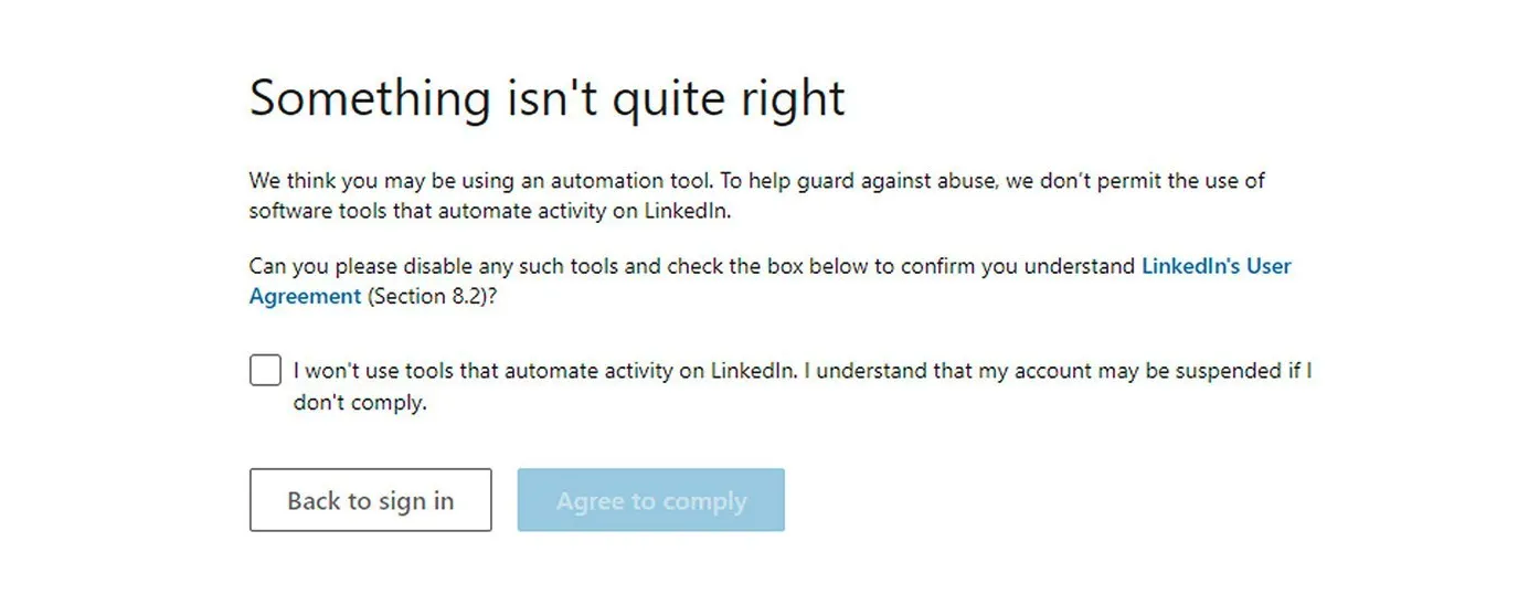 LinkedIn restriction warning popup asking user to slow down automation activity